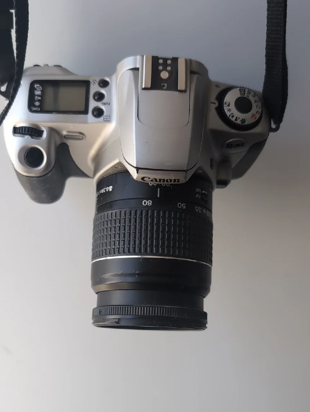 Vintage Canon Silver and Black Camera with Zoom Lens
